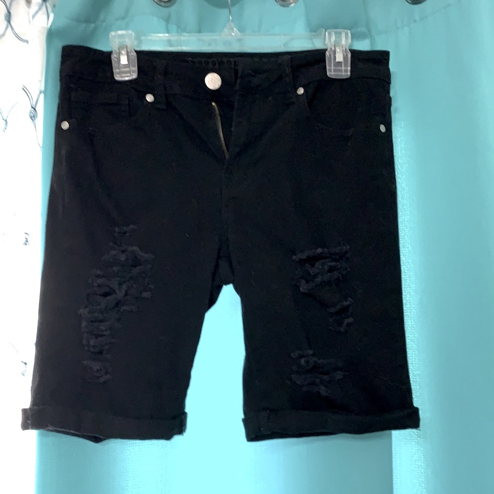 Black ripped shorts